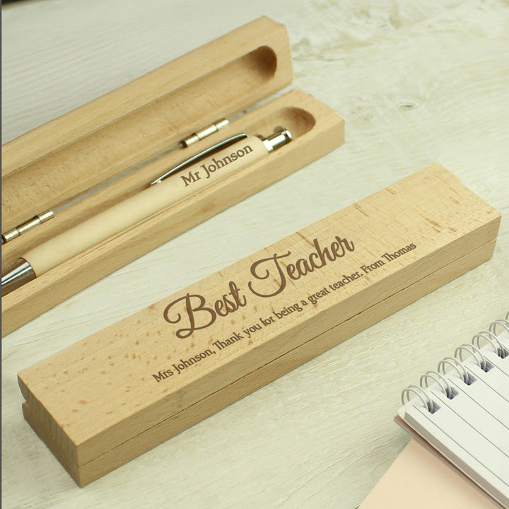 Personalised wooden pen and box with an engraved message