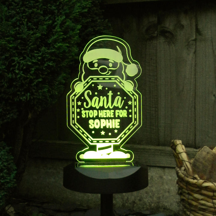Personalised Santa Stop Here Sign Outdoor Solar Light – alternative view