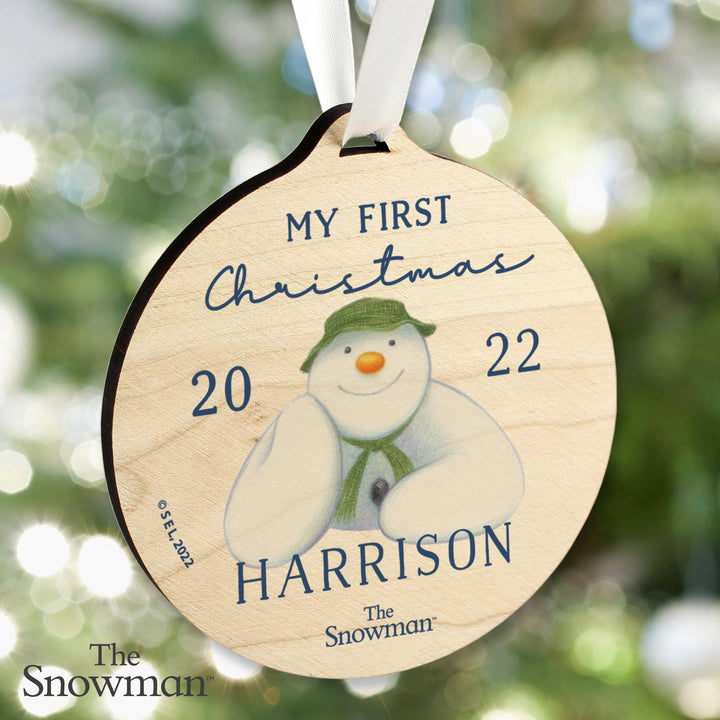 Personalised The Snowman My First Christmas Round Wooden Decoration, The Personal Shop, personalised gifts