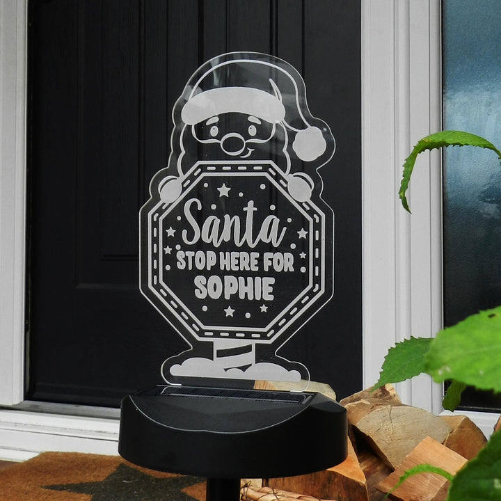 Personalised Santa Stop Here Sign Outdoor Solar Light – alternative view