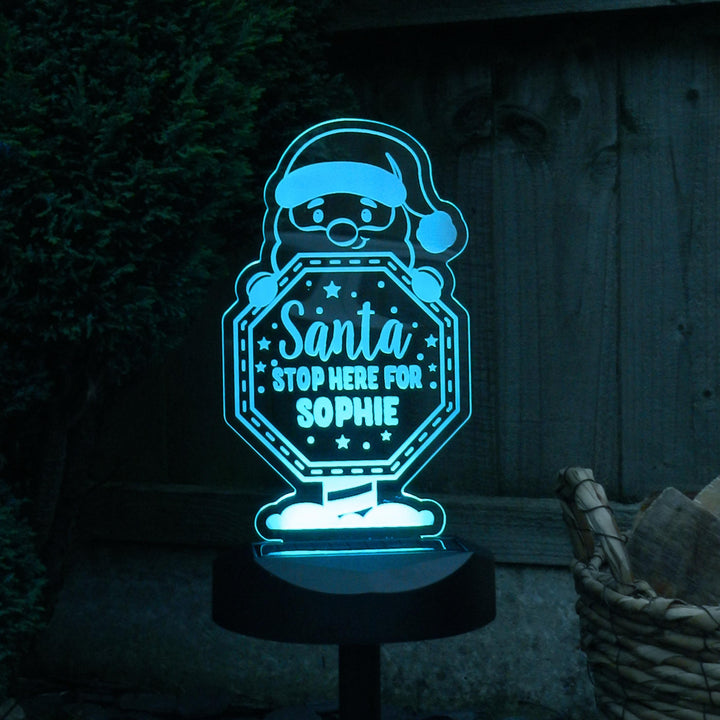 Personalised Santa Stop Here Sign Outdoor Solar Light – alternative view