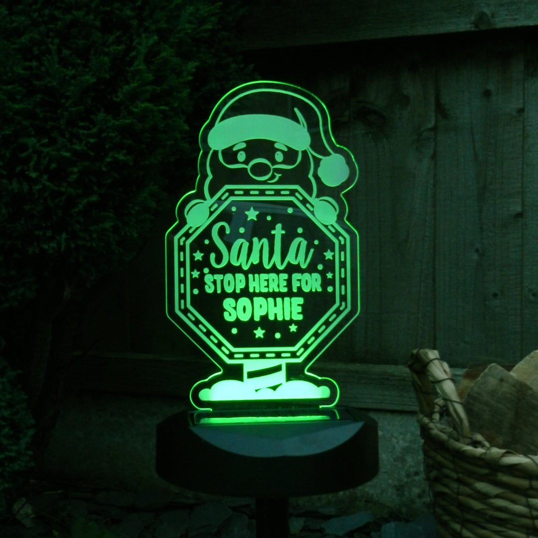 Personalised Santa Stop Here Sign Outdoor Solar Light – alternative view