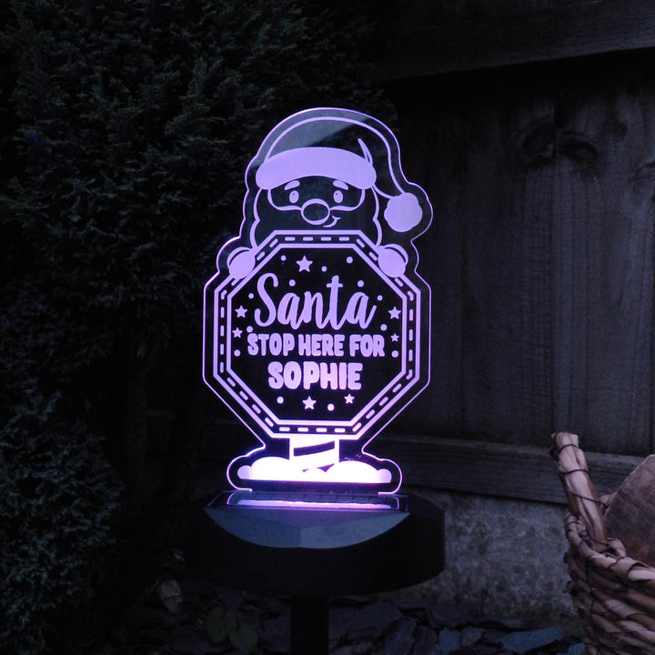 Personalised Santa Stop Here Sign Outdoor Solar Light – alternative view