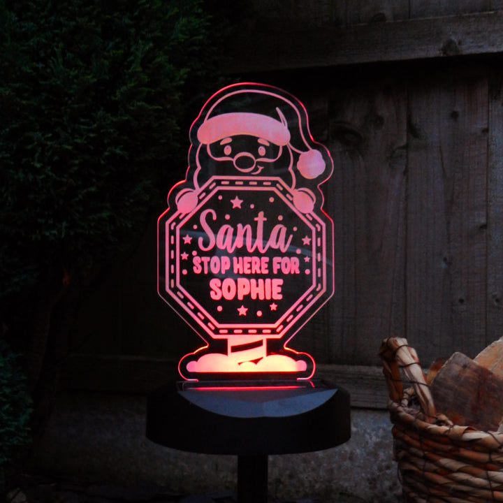 Personalised Santa Stop Here Sign Outdoor Solar Light – alternative view